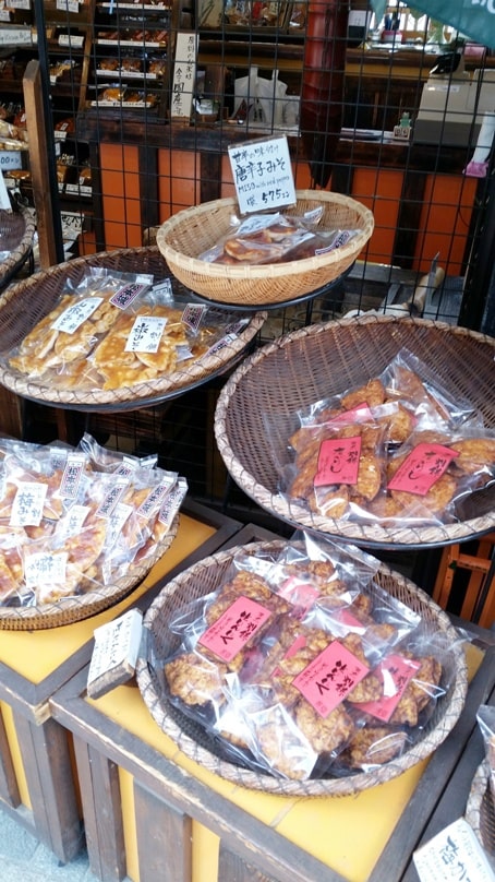 Nawate Street in Matsumoto for Japanese street food snacks in Japan - senbei rice crackers. Backpacking japan travel blog